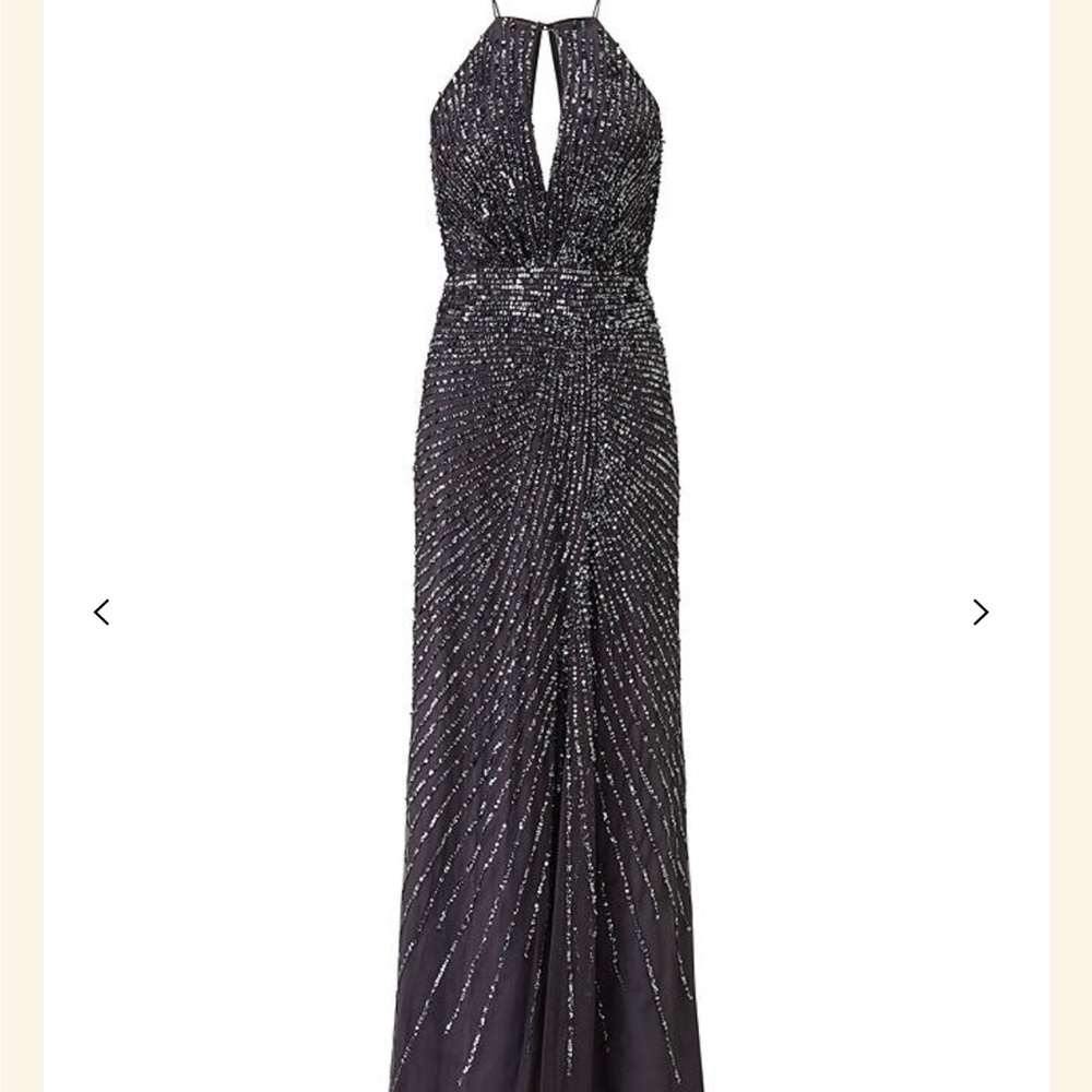 Adrianna Papell Halterneck
Fully Beaded Gown.